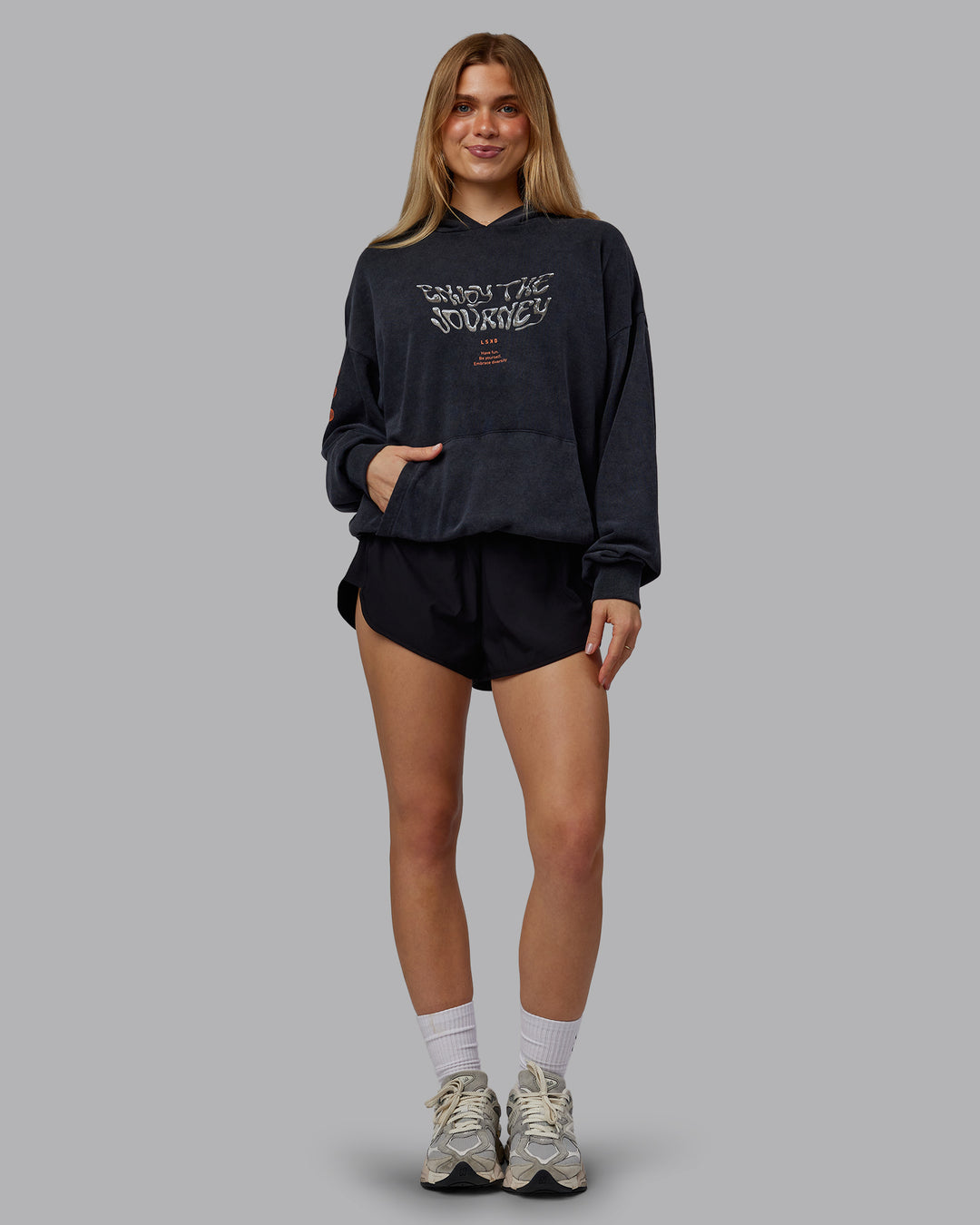 Woman wearing Chrome Washed Oversized Hoodie - Black | Model:Emilie | Size:XS