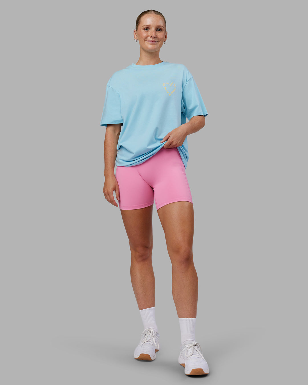 Woman wearing Love The Process FLXCotton Oversize Tee - Crystal Blue-Lemon | Model:Neve | Size:XS