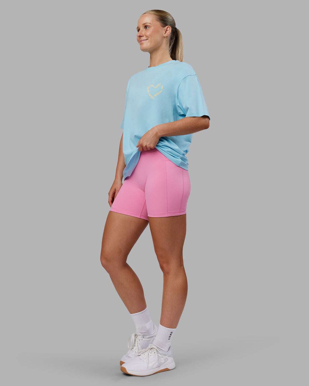 Woman wearing Love The Process FLXCotton Oversize Tee - Crystal Blue-Lemon | Model:Neve | Size:XS