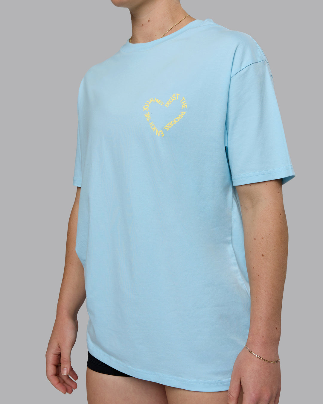 Woman wearing Love The Process FLXCotton Oversize Tee - Crystal Blue-Lemon | Model:Sav | Size:XS