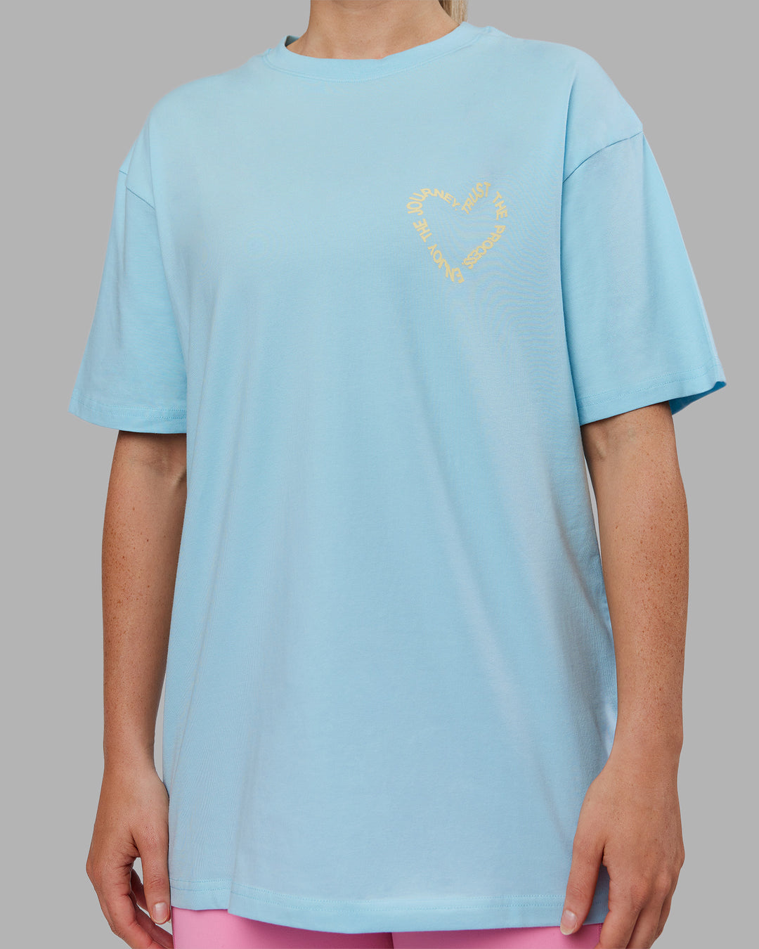 Woman wearing Love The Process FLXCotton Oversize Tee - Crystal Blue-Lemon | Model:Neve | Size:XS
