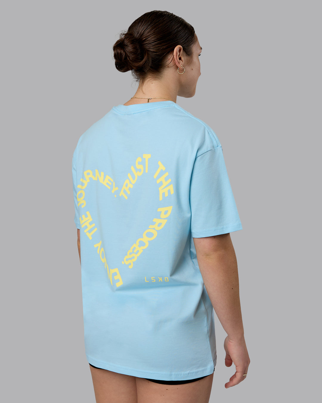 Woman wearing Love The Process FLXCotton Oversize Tee - Crystal Blue-Lemon | Model:Sav | Size:XS