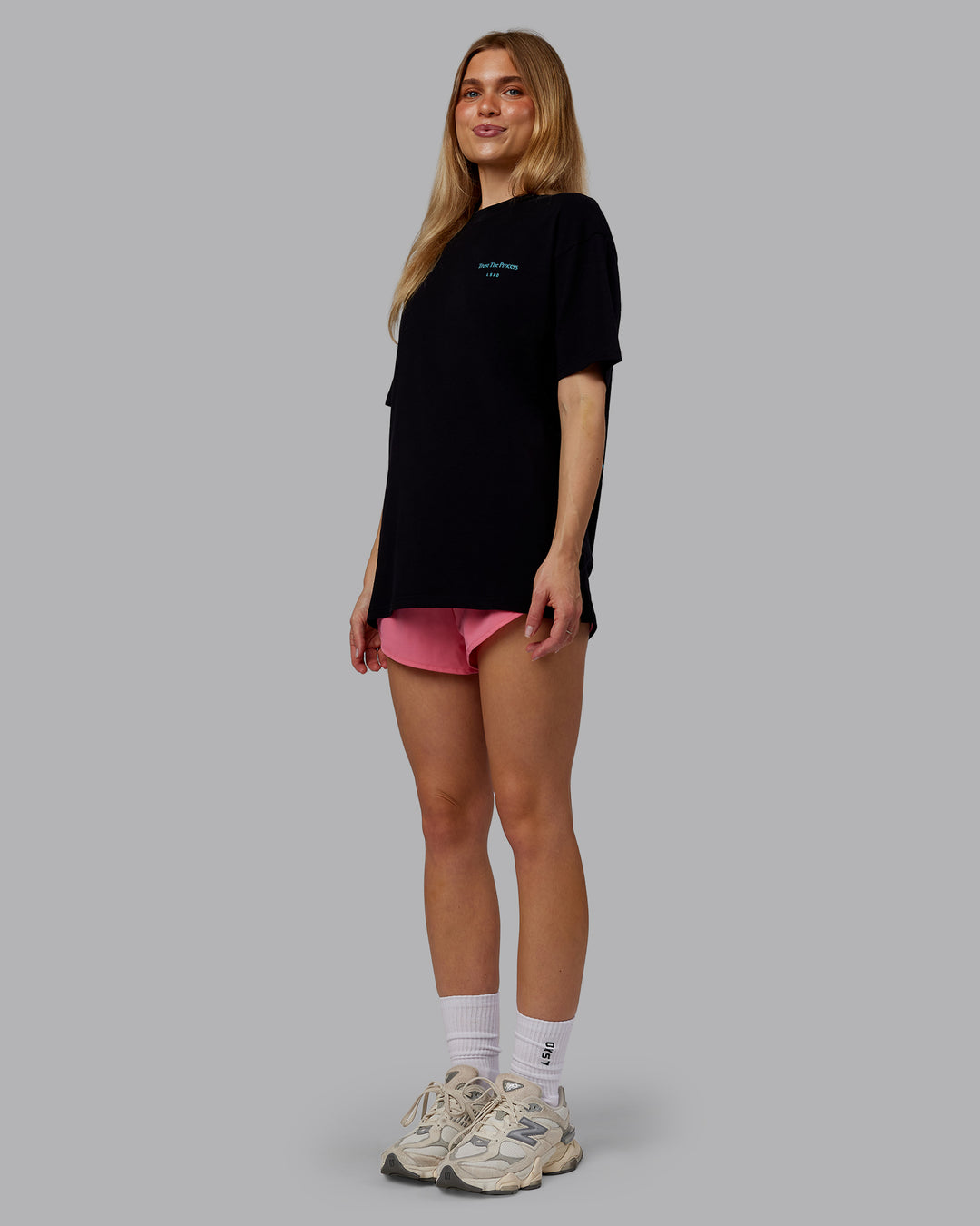 Woman wearing Trust The Process 2.0 FLXCotton Tee Oversize - Black-Blue Atoll | Model:Emilie | Size:XS