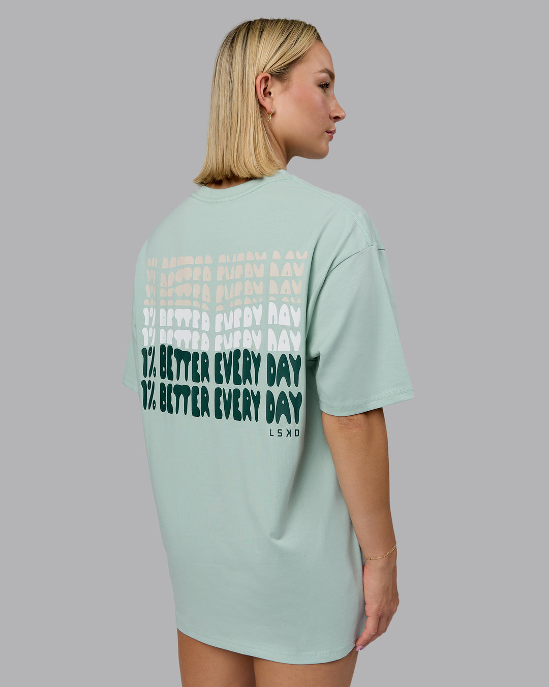 Woman wearing On Repeat FLXCotton Oversized Tee - Blue Haze-Dark Moss | Model:Halle | Size:XS