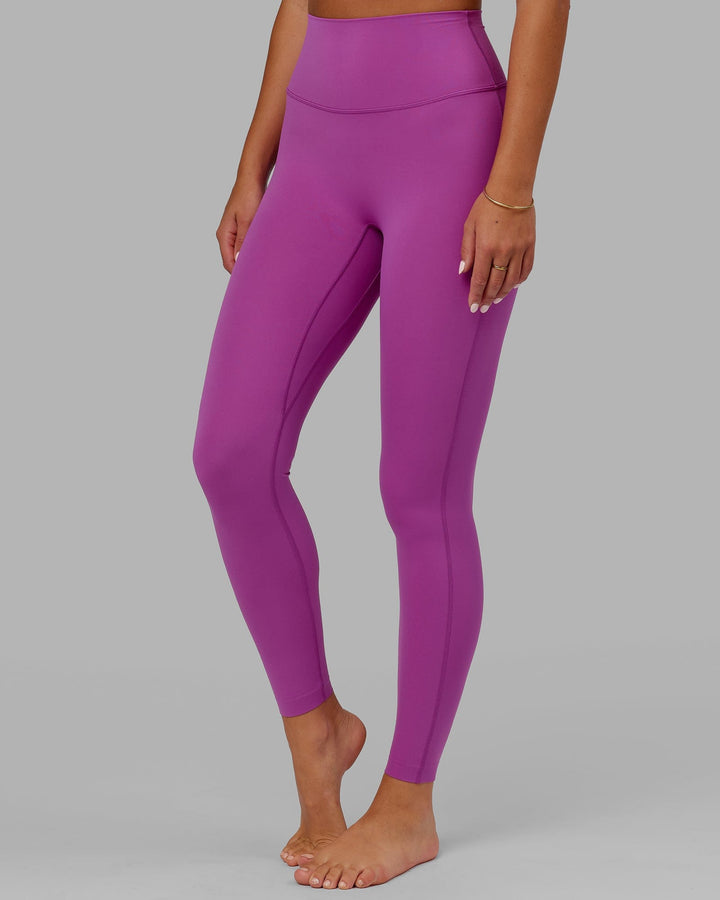 Woman wearing Elixir Full Length Tight - Orchid