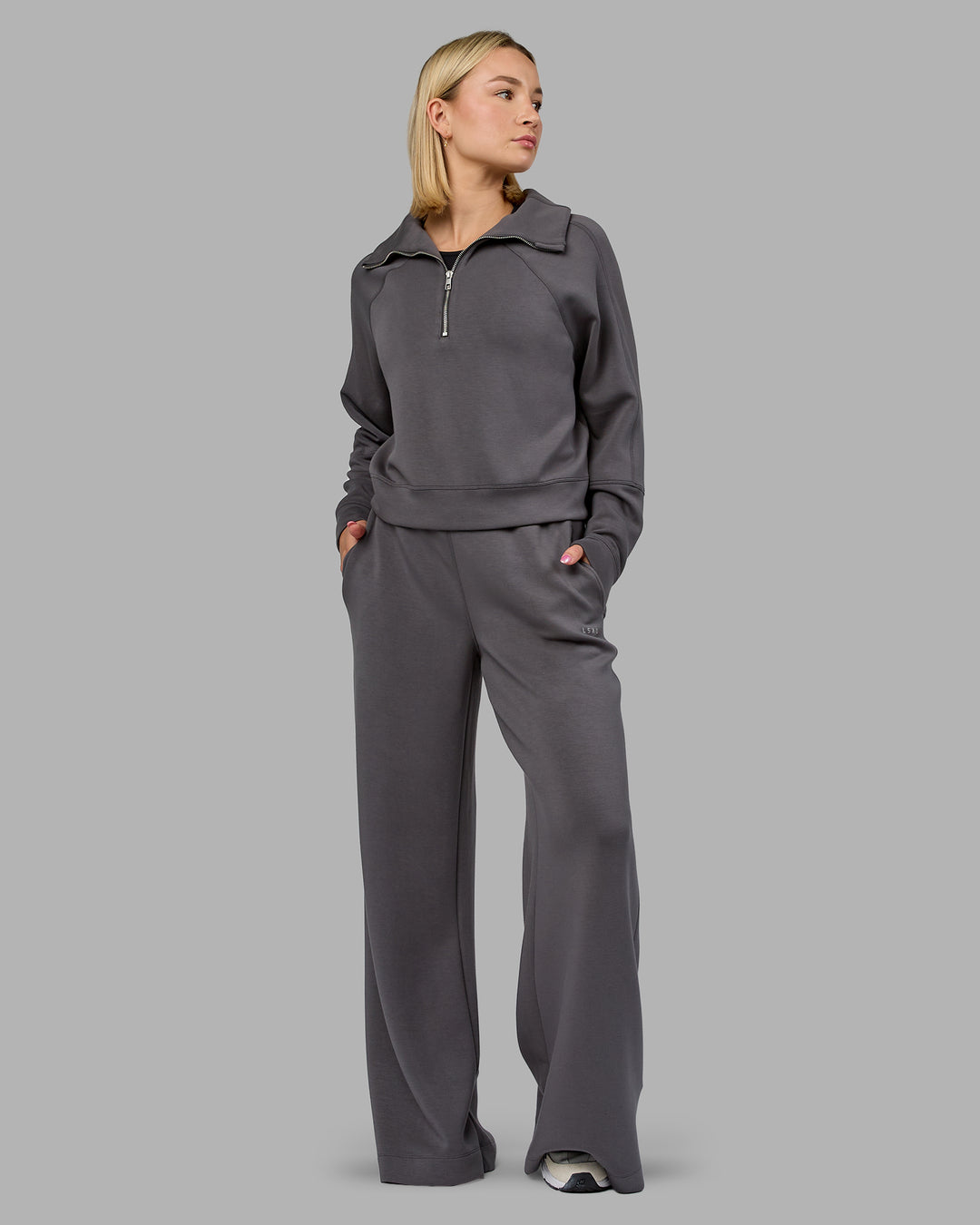Woman wearing Elevate SoftTouch Wide Leg Pant - Asphalt | Model:Halle | Size:S
