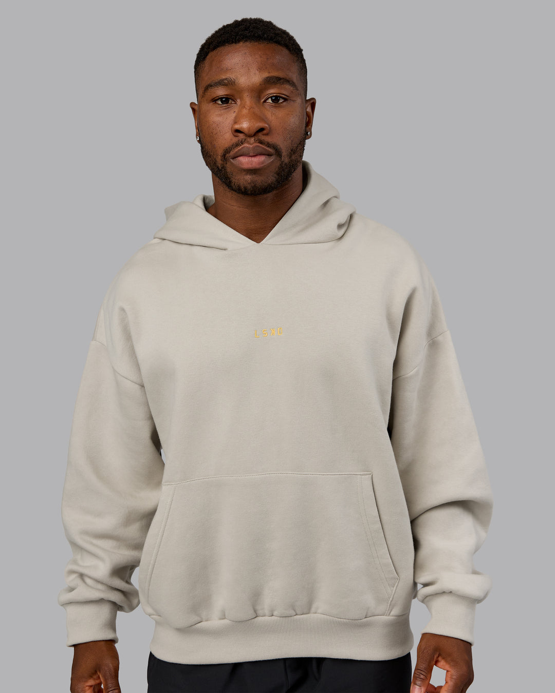 Man wearing MVP Oversized Hoodie - Shale Beige | Model:Sam | Size:L