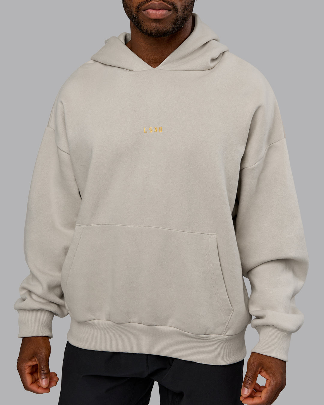 Man wearing MVP Oversized Hoodie - Shale Beige | Model:Sam | Size:L