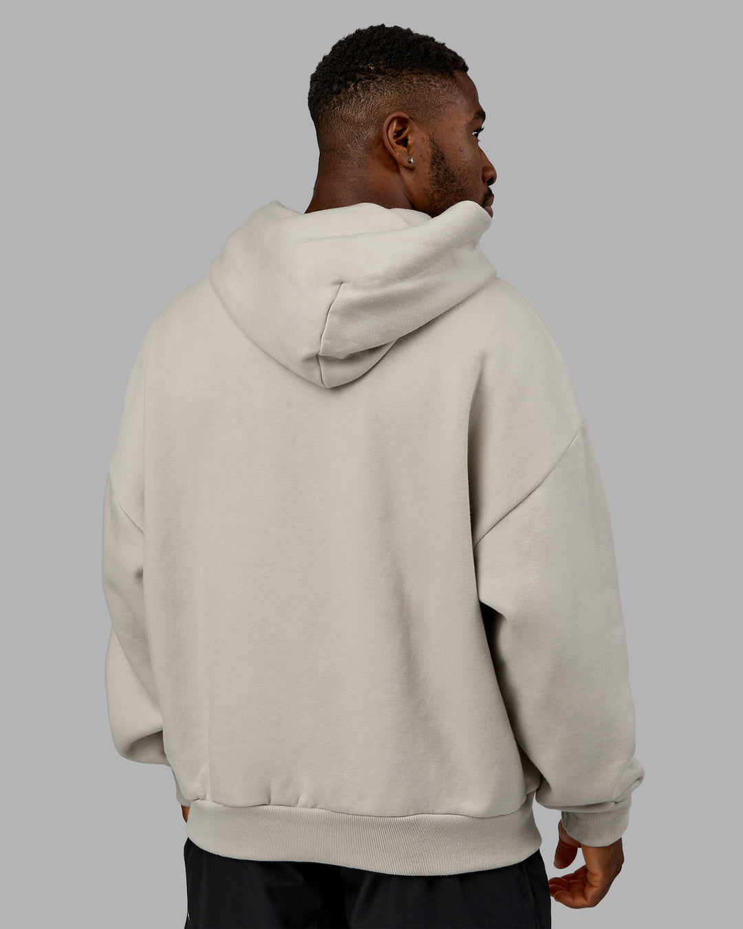 Man wearing MVP Oversized Hoodie - Shale Beige | Model:Sam | Size:L