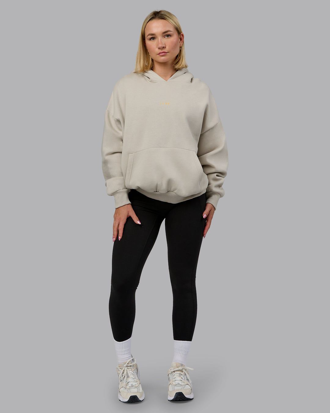 Woman wearing MVP Oversized Hoodie - Shale Beige | Model:Halle | Size:XS