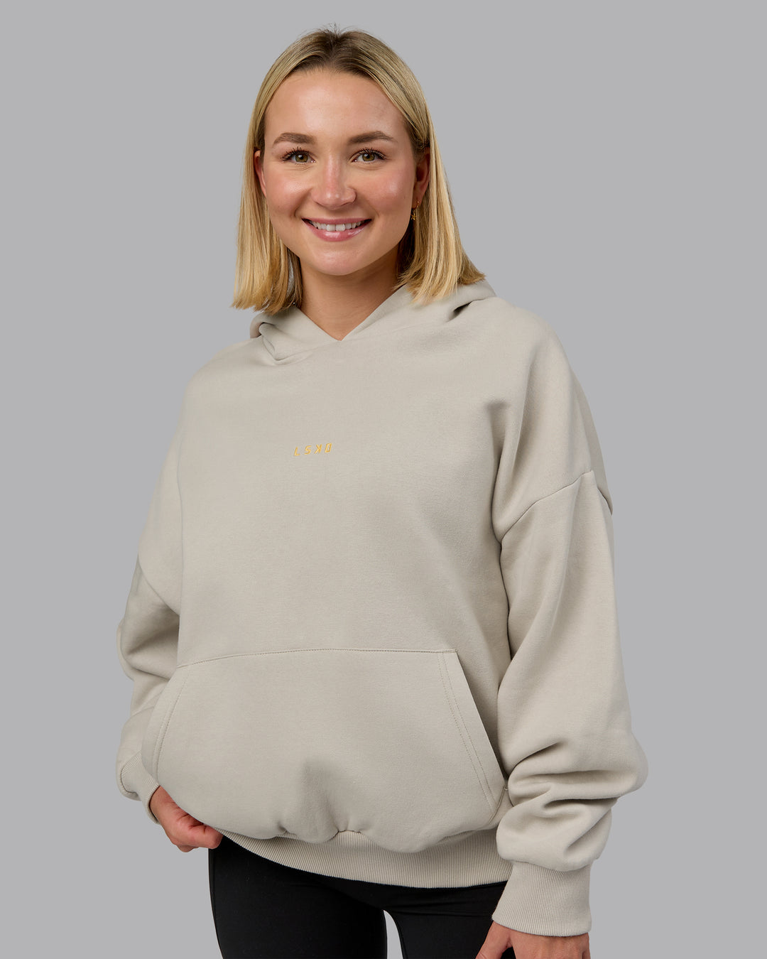 Woman wearing MVP Oversized Hoodie - Shale Beige | Model:Halle | Size:XS