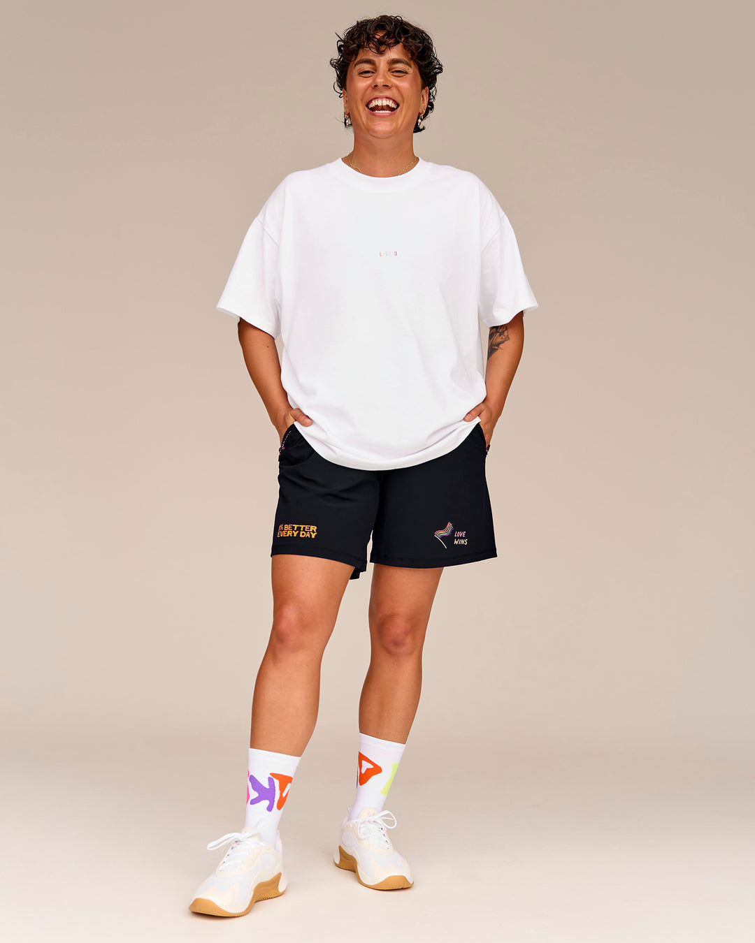 Man wearing Pride Sticker Boxy Tee - White
