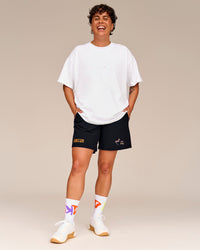 Man wearing Pride Sticker Boxy Tee - White