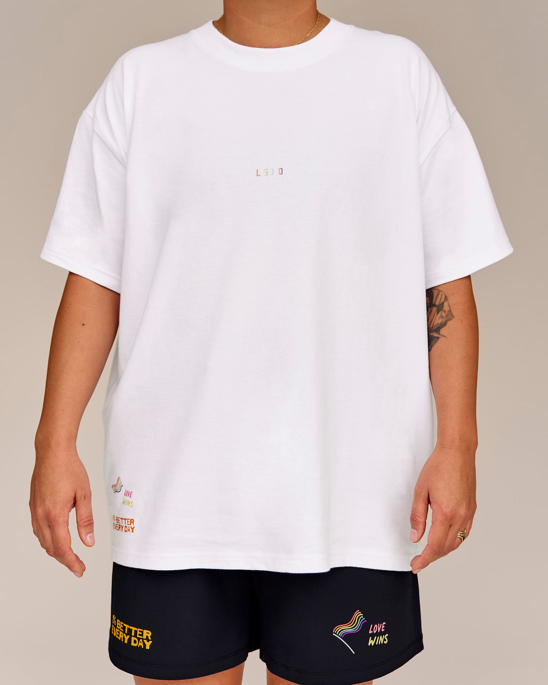 Man wearing Pride Sticker Boxy Tee - White