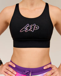 Woman wearing Accelerate Graphic Sports Bra - Black-Radiate