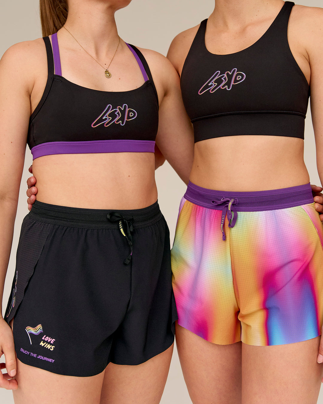 Woman wearing Accelerate Graphic Sports Bra - Black-Radiate