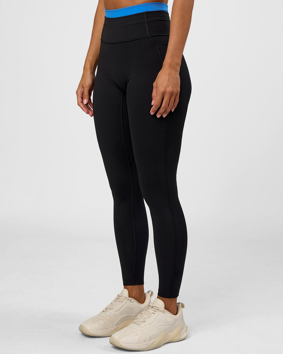 Woman wearing Liberate High-Rise Full Length Legging Pockets - Black-Palace Blue | Model:Brylee | Size:XS - view 4