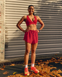 Woman wearing Accelerate 3" High-Rise Running Short - Scarlet