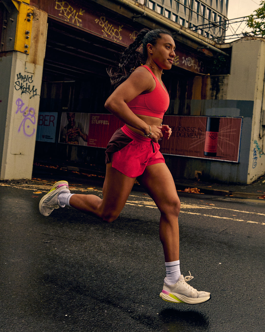 Woman wearing Accelerate 3" Mid-Rise Running Short - Cherry Lacquer-Scarlet