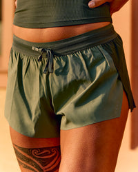 Woman wearing Accelerate 3" Mid-Rise Running Short - Pure Olive-Fog | Thumbnail Index: 14