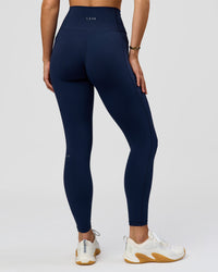 Woman wearing O.G. Fusion Ultra High-Rise Full Length Legging Pockets - Future Navy | Model:Amity| Size:S | Thumbnail Index: 3