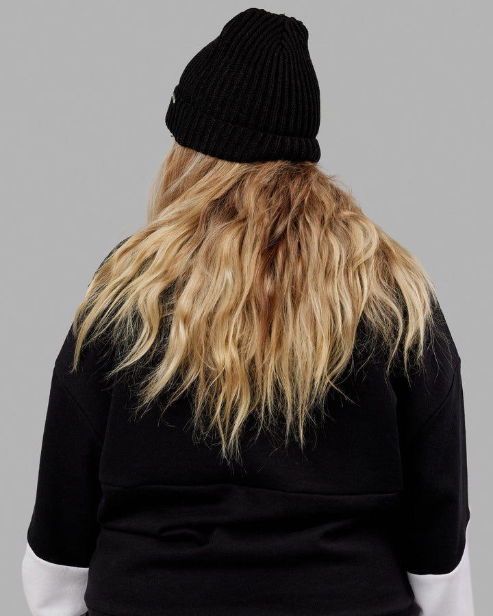 Woman wearing Alpine Beanie - Black