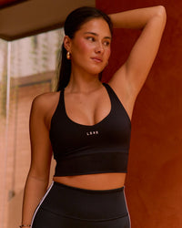 Woman wearing Stellar Long Line Sports Bra - Black-White | Model:Bianca | Size:S | Thumbnail Index: 7