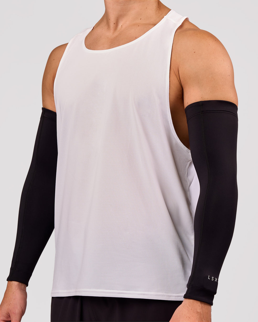 Man wearing Pace Run Sleeves - Black - view 6