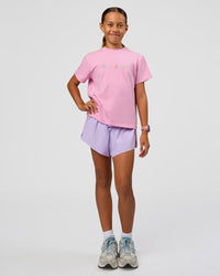 Kid wearing Kids Enjoy the Journey FLXCotton Tee - Bubblegum | Model:Jayla | Size:10