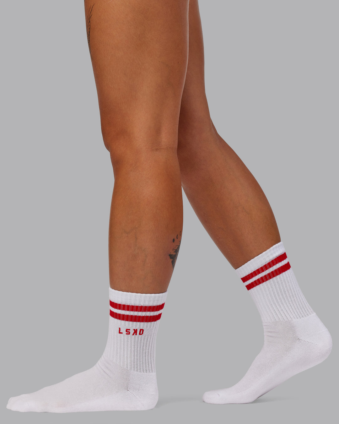 Model wearing Quarter Sock Pack - Candy Pink-Flame | Size:OS