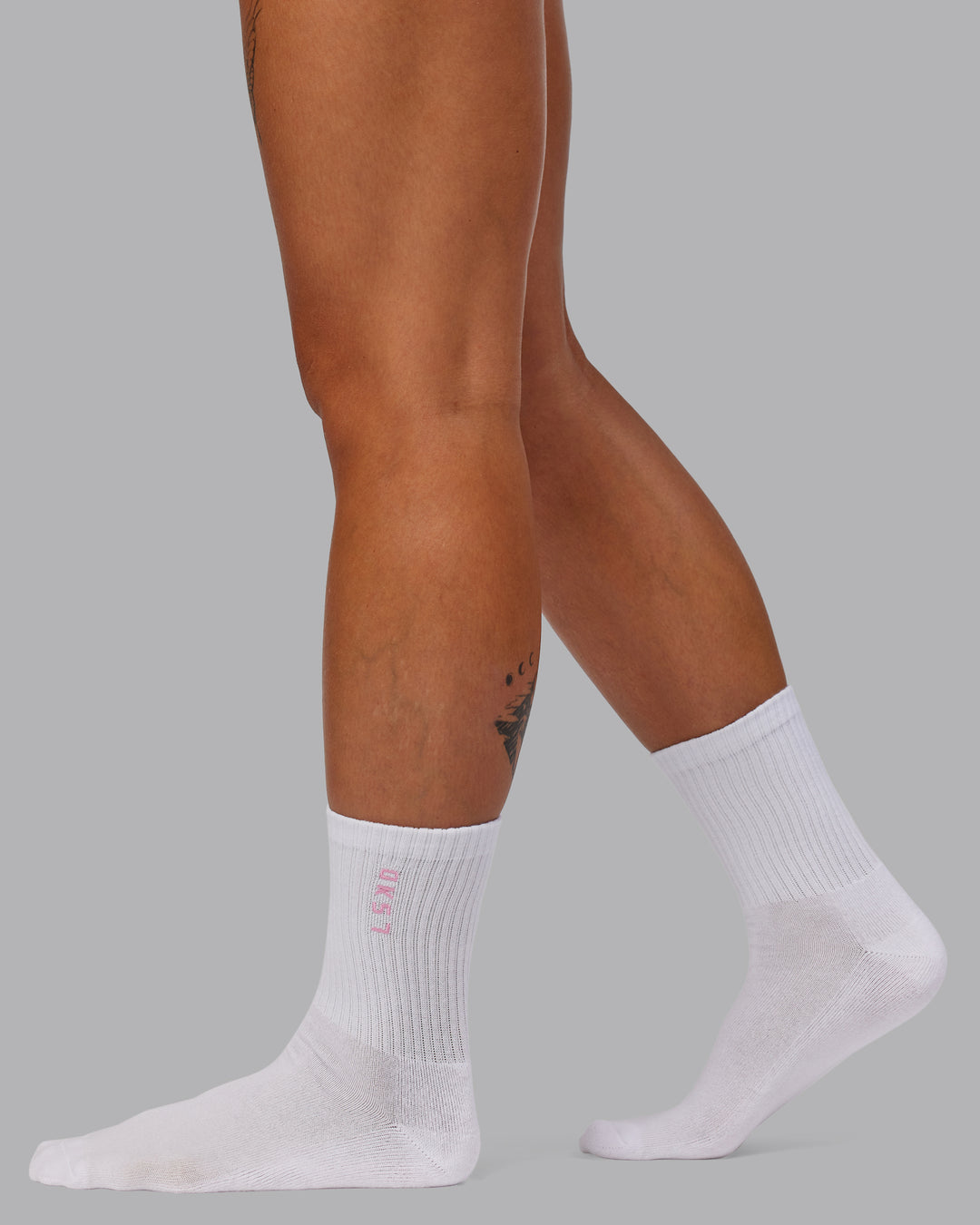 Model wearing Quarter Sock Pack - Candy Pink-Flame | Size:OS