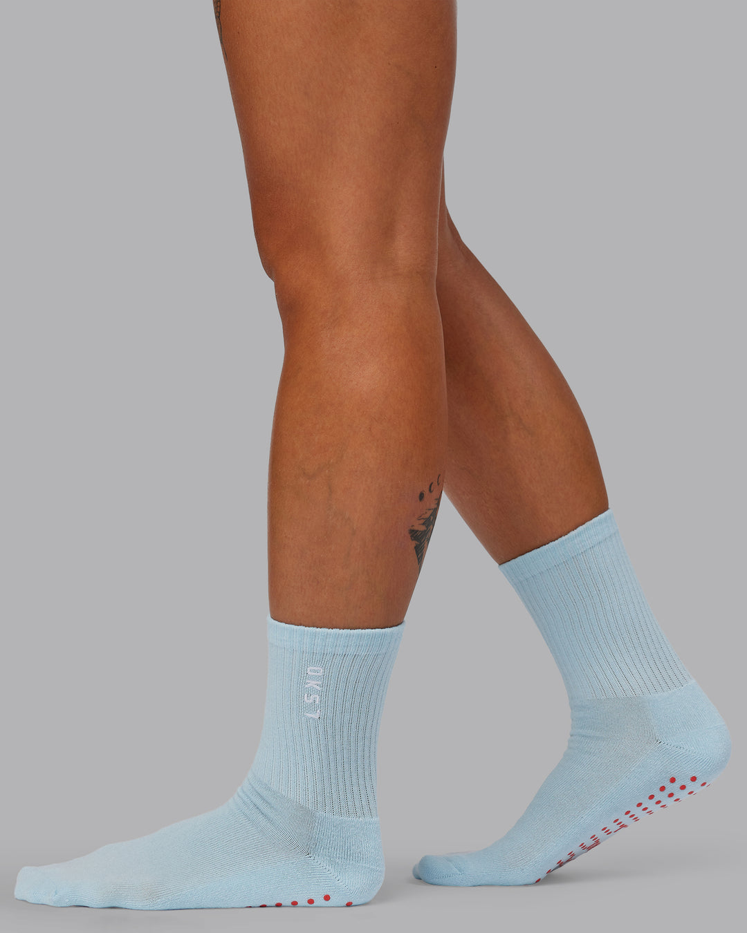 Model wearing Quarter Sock Pack - Light Cyan-Grenadine | Size:OS