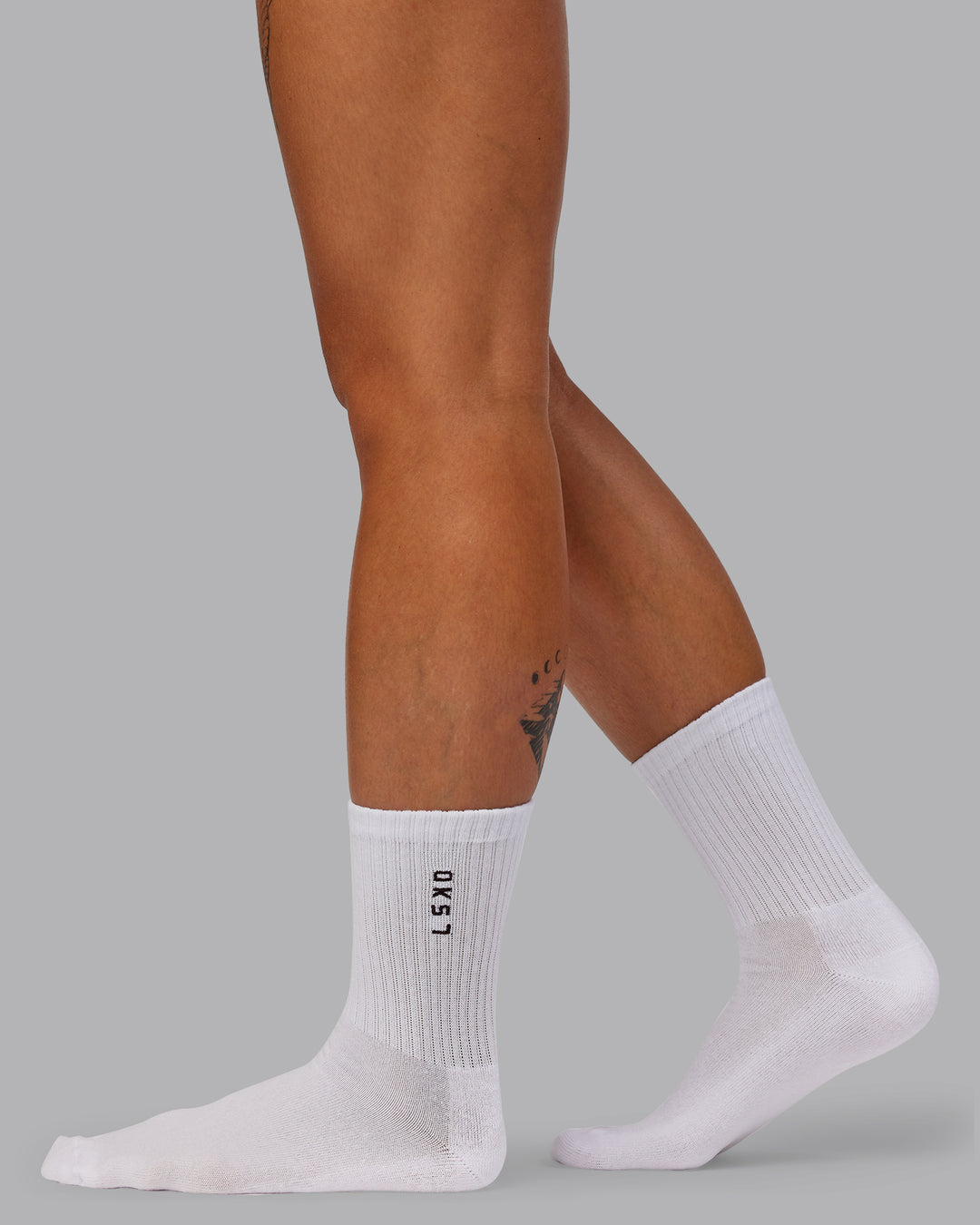 Model wearing Quarter Sock Pack - Multi-Choc | SIze:OS