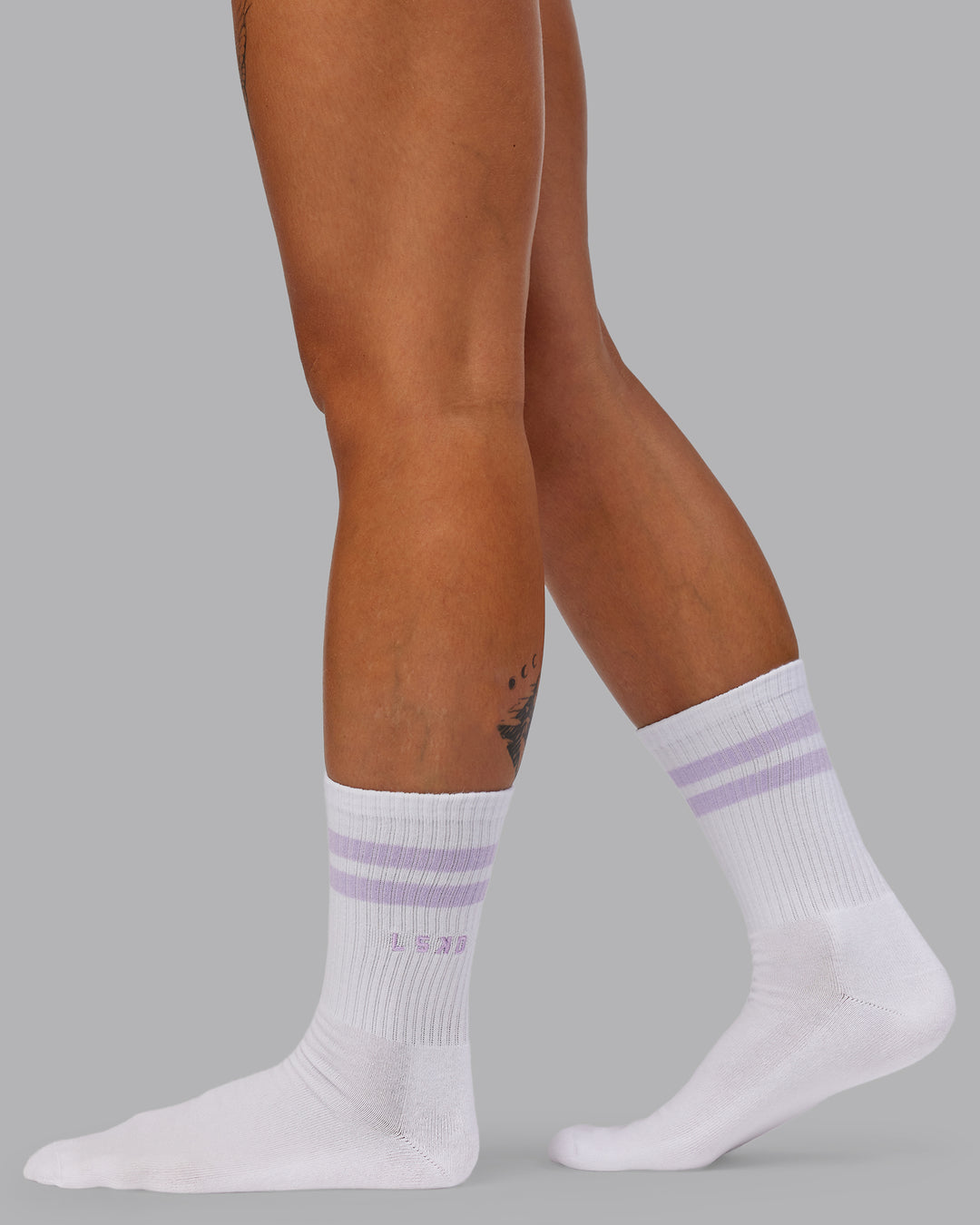 Model wearing Fast-Heritage-Signal Pack - Black/White-Galactic Lilac/Dark Moss Success | Size:OS