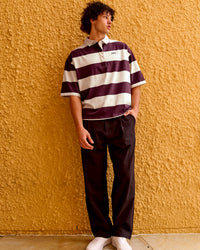 
Man wearing Oversized Rugby Polo - Off White-Cherry | Model:Malebo | Size:M