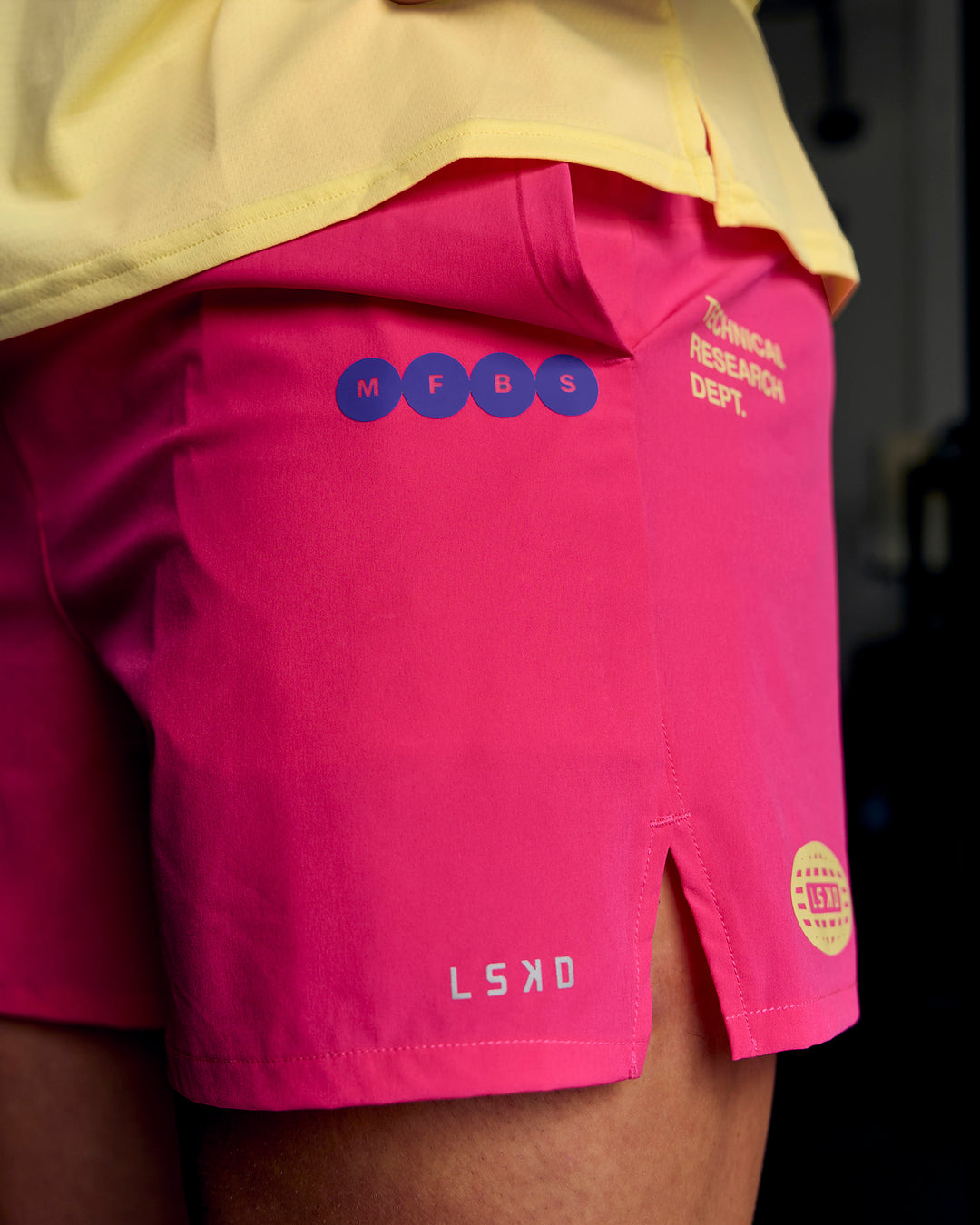 Man wearing Pace 5" Lined Running Short - Game Plan Ultra Pink - view 14