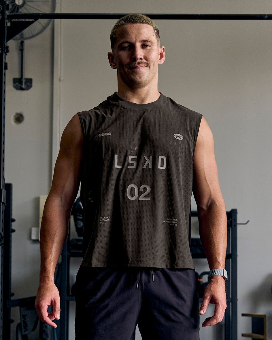 Man wearing Game Plan Boxy Tank - Onyx