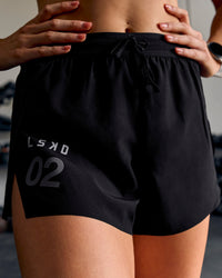 Woman wearing Accelerate 3" High-Rise Running Short - Black-Tech Department | Thumbnail Index: 8