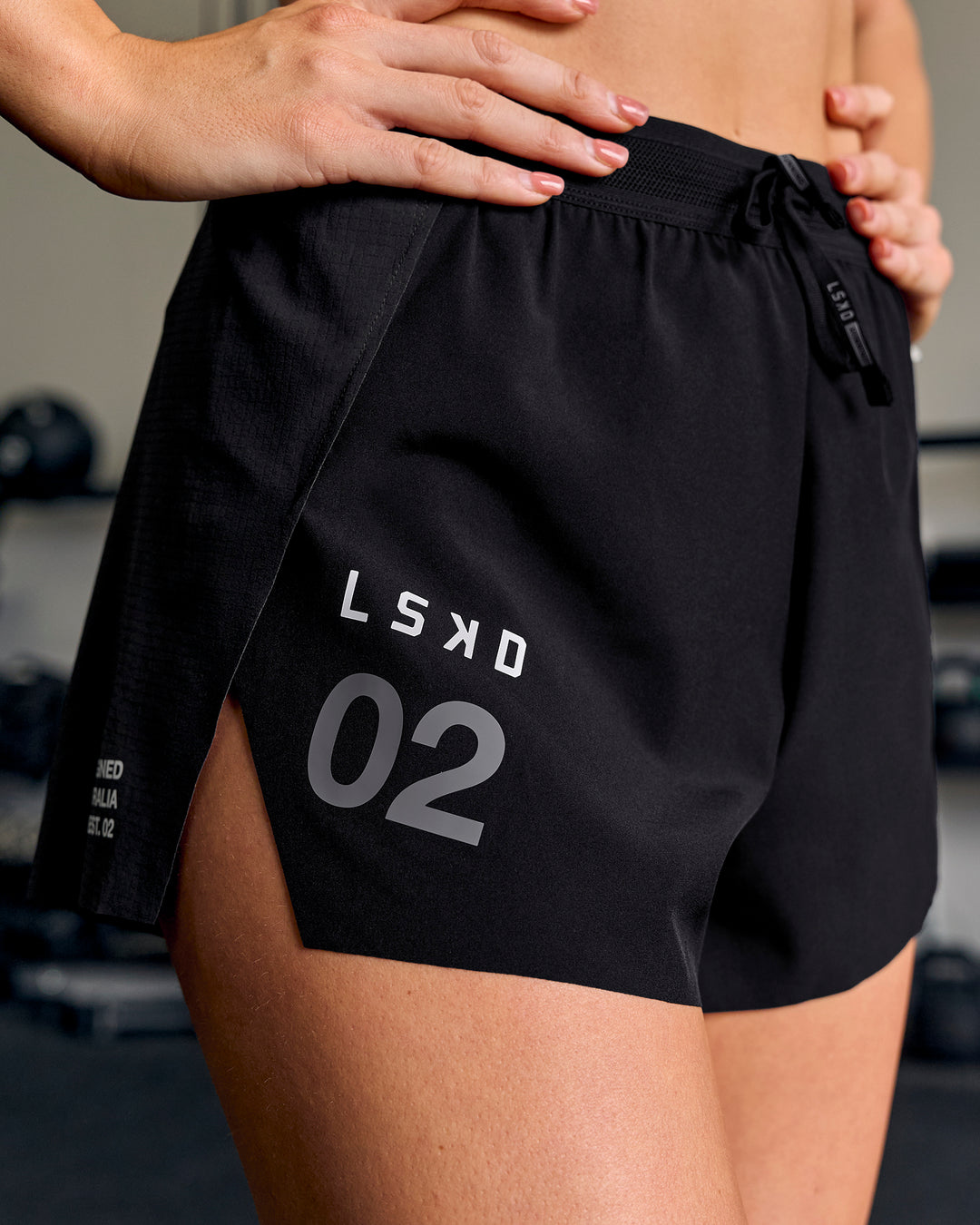 Woman wearing Accelerate 3" High-Rise Running Short - Black-Tech Department - view 18