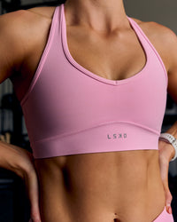 Woman wearing Stamina Amplify Sports Bra - Pink Rose | Thumbnail Index: 12