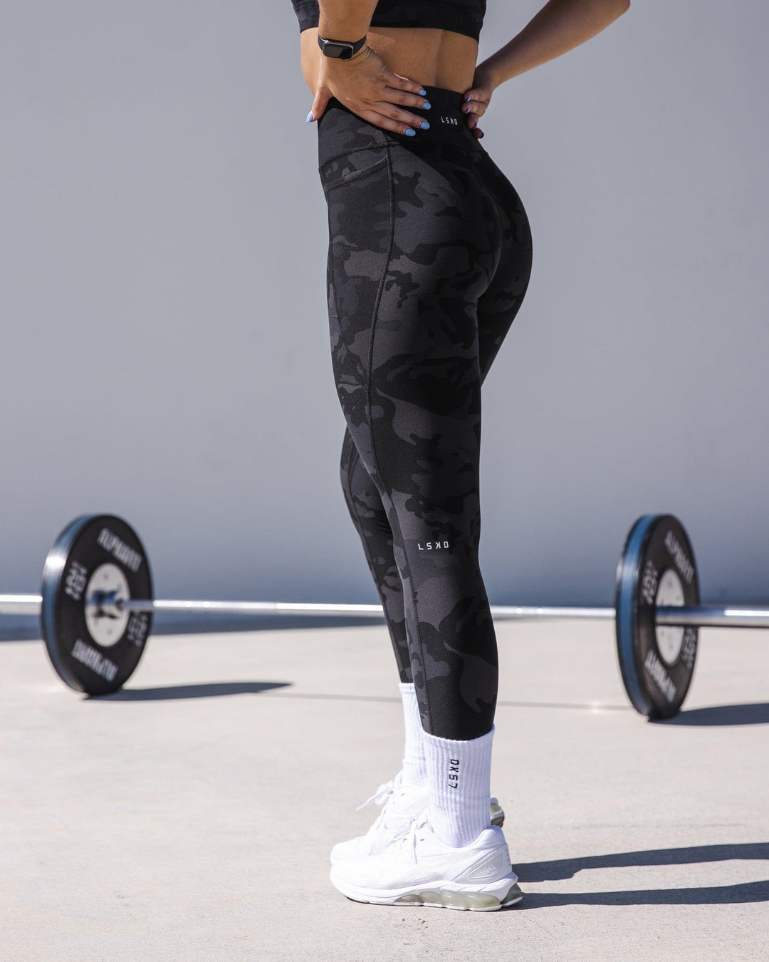 Woman wearing Fusion Ultra High-Rise Full Length Legging Pockets - Black Camo | Model:Christine | Size:S