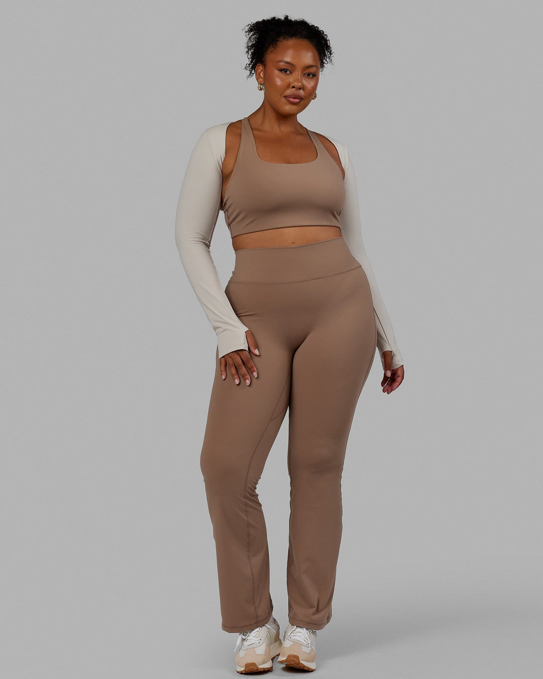 Woman wearing Energy LS Bolero - Shale Beige