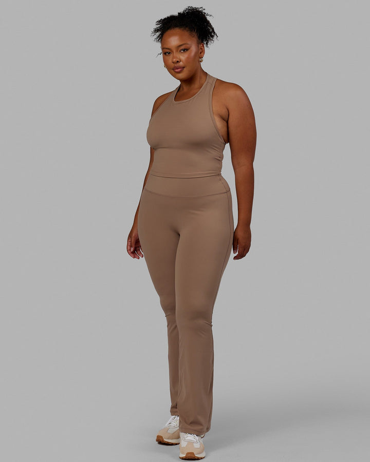 Woman wearing LHFM Tank - Doe