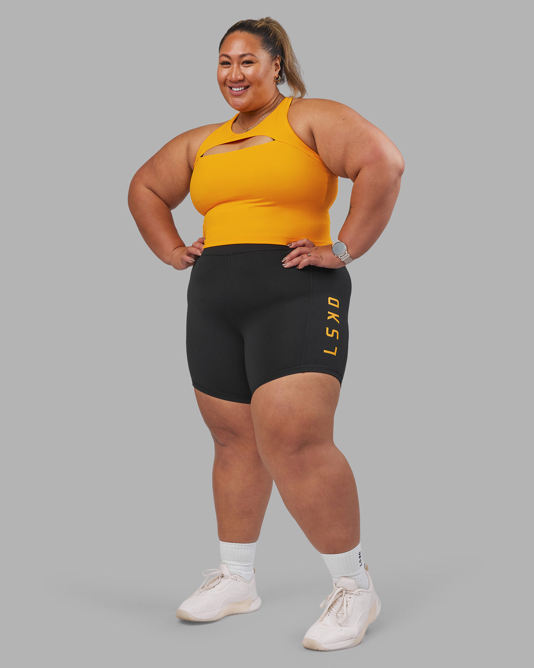 Woman wearing Be Bold Performance Tank - Zinnia | Model:Lilz | Size:3XL