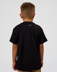 Kid wearing Kid wearing Kids Enjoy the Journey FLXCotton Tee - Bubblegum | Model:Jax | Size:6