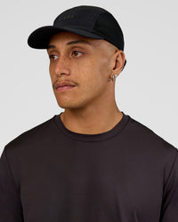 Man wearing Accelerate Cap - Black