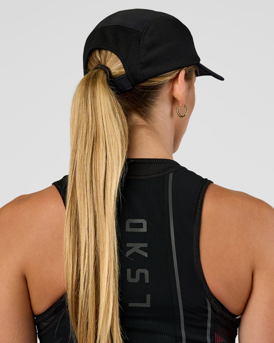 Woman wearing Accelerate Cap - Black