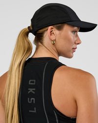 Woman wearing Accelerate Cap - Black