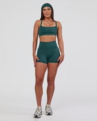 Woman wearing All Day Headband - Transformative Teal