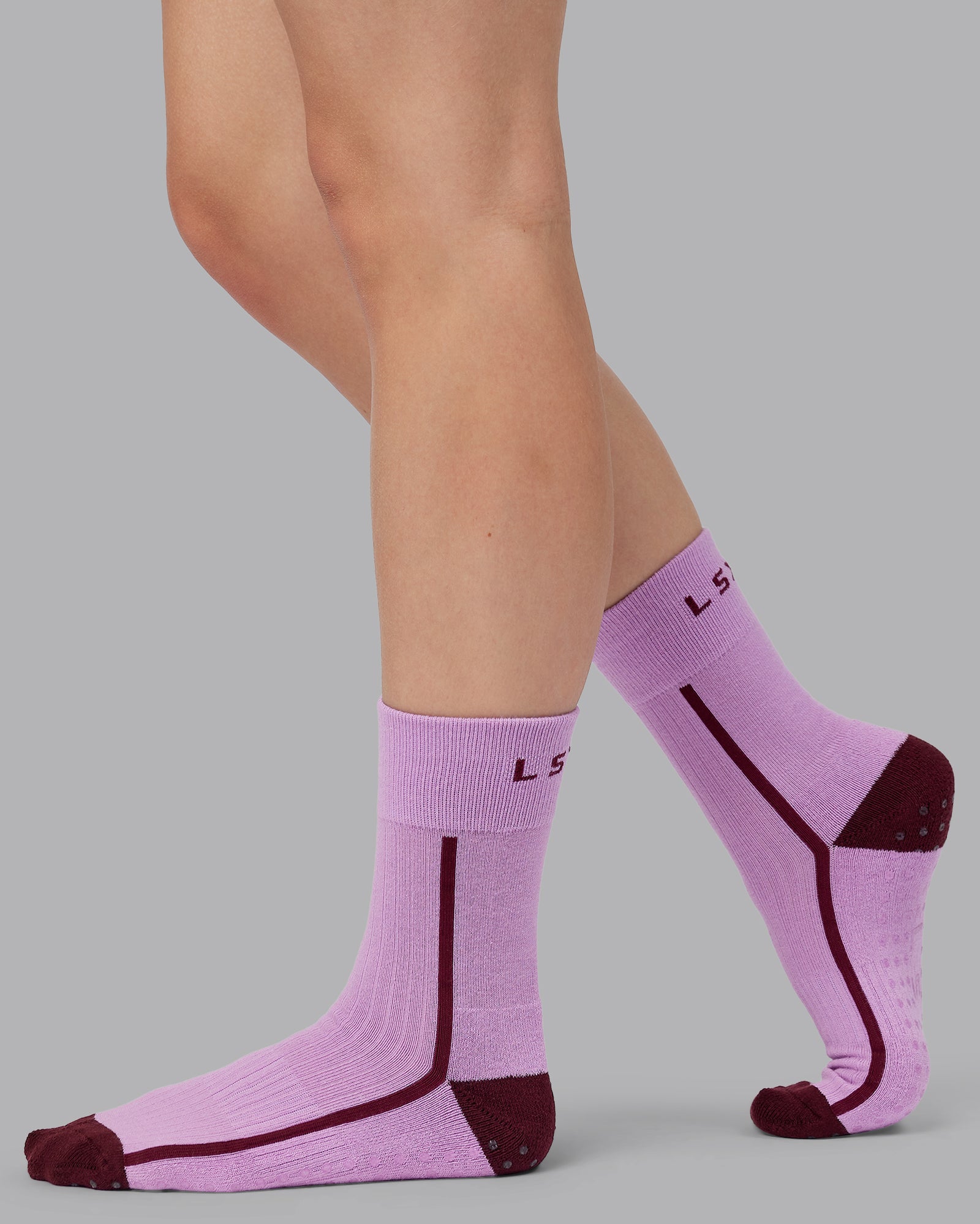 Woman wearing Bend Crew Pilates Grip Socks - Light Violet